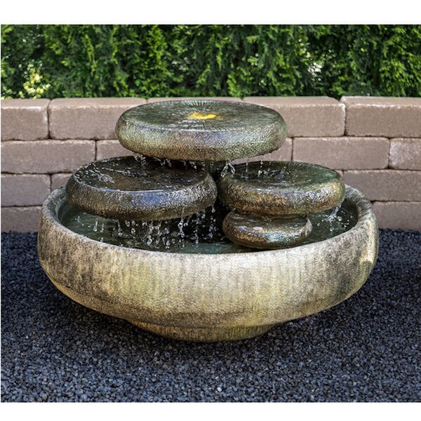 Water Lilies Fountain features shimmering pools of water Retro Modern
